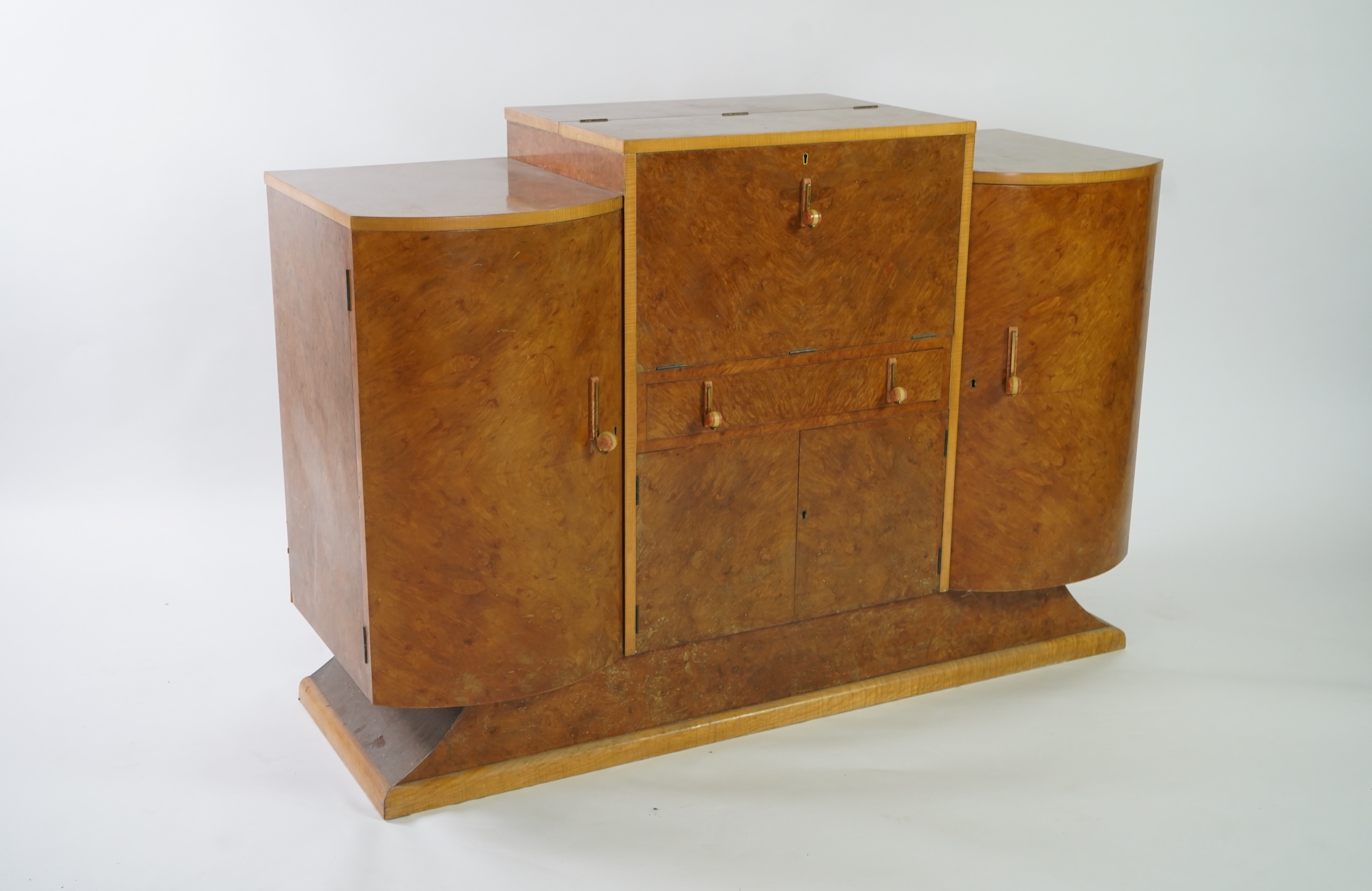 Attributed to Harry and Lou Epstein: An Art Deco burr walnut dining suite